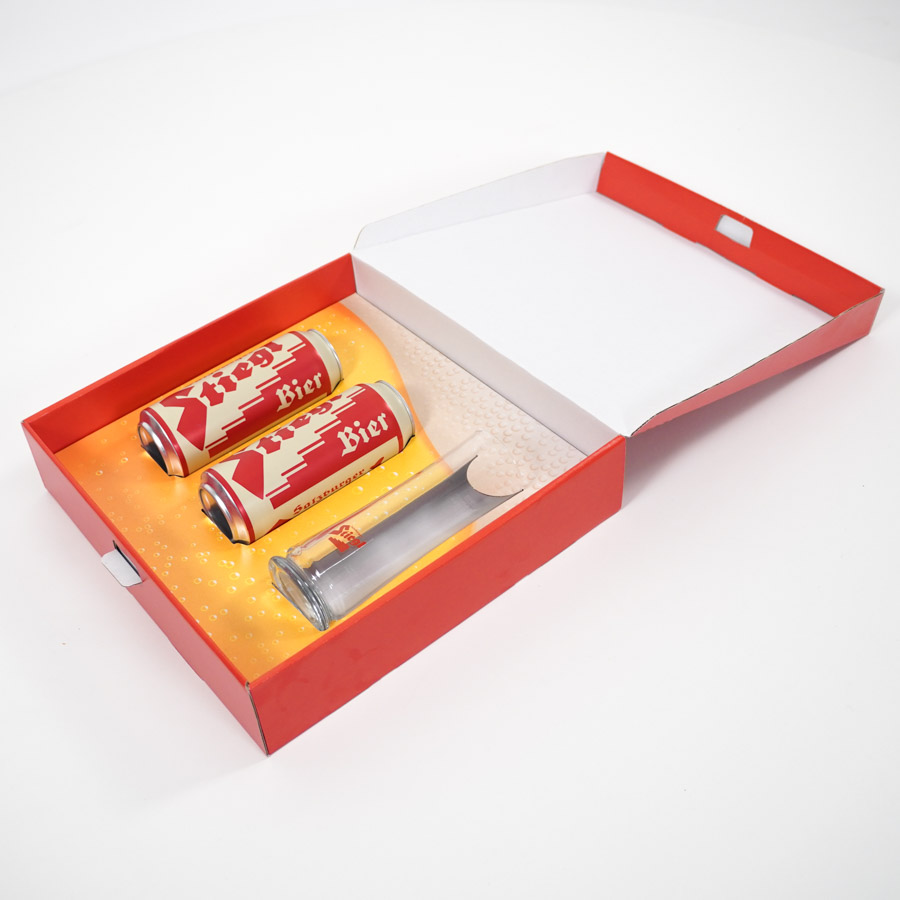 Promotionbox von Stiegl Bier mit 2 Dosen und einem Bierglas